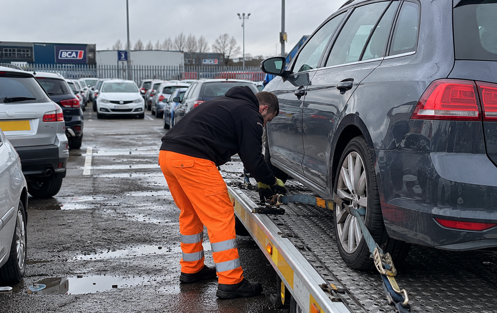 Vehicle being collected from a UK vehicle auction